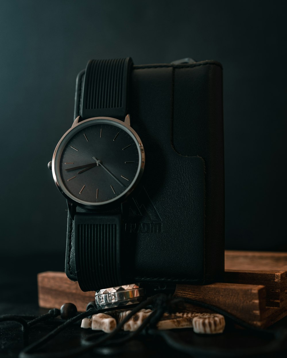 a watch sitting on top of a wooden box