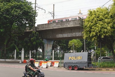a person riding a motorcycle on a city street