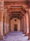 a large building with columns and a doorway