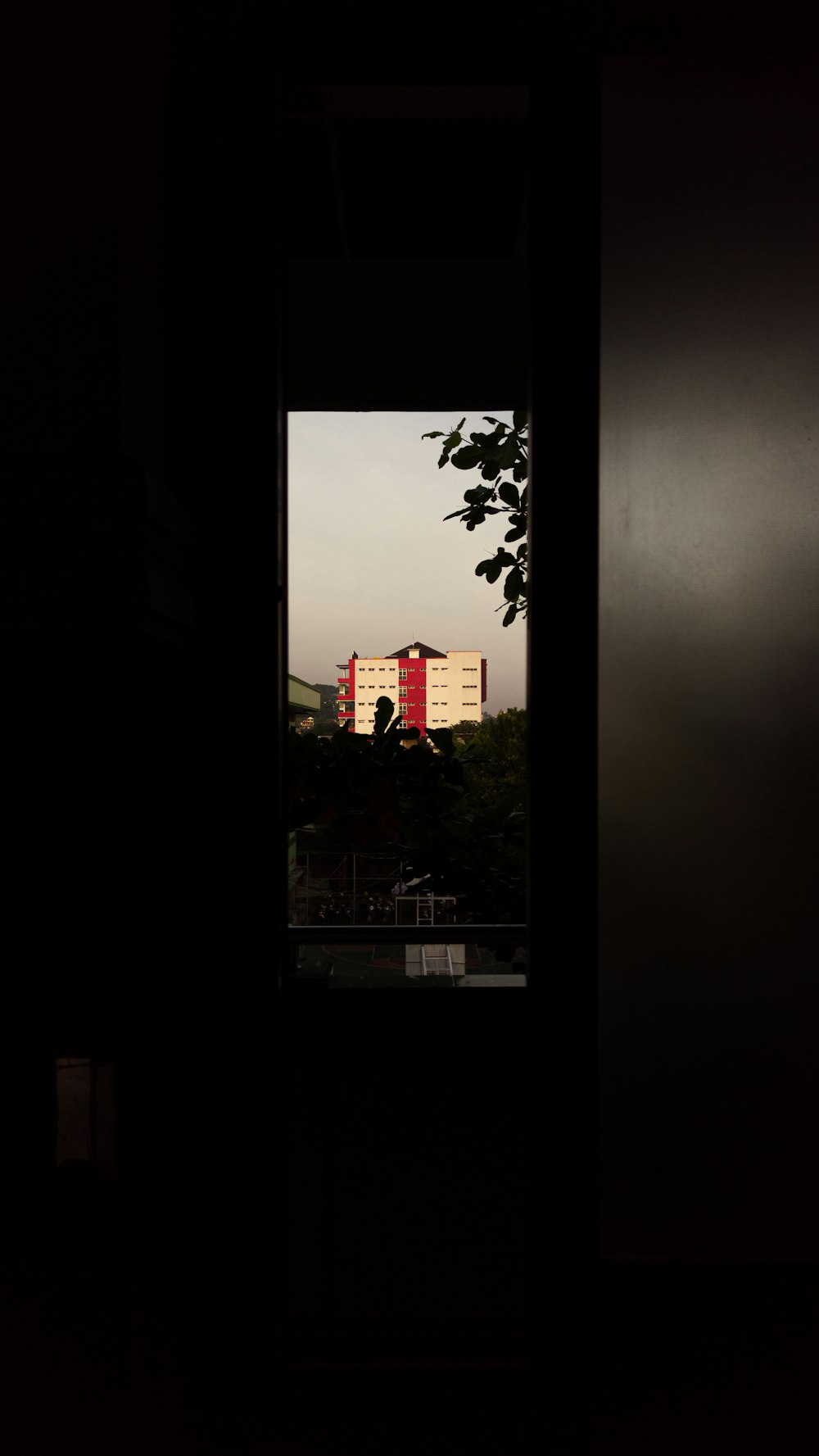 a view of a building through a doorway