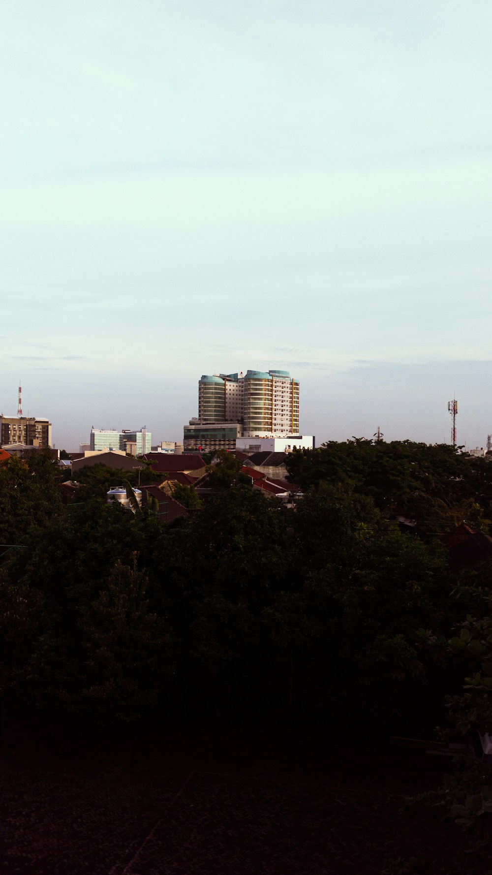 a view of a city with tall buildings