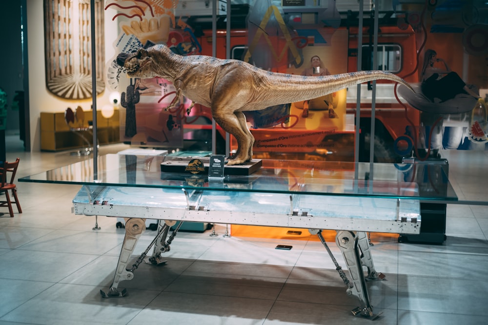 a dinosaur statue on display in a museum