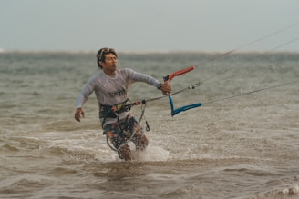 a man is water skiing in the ocean