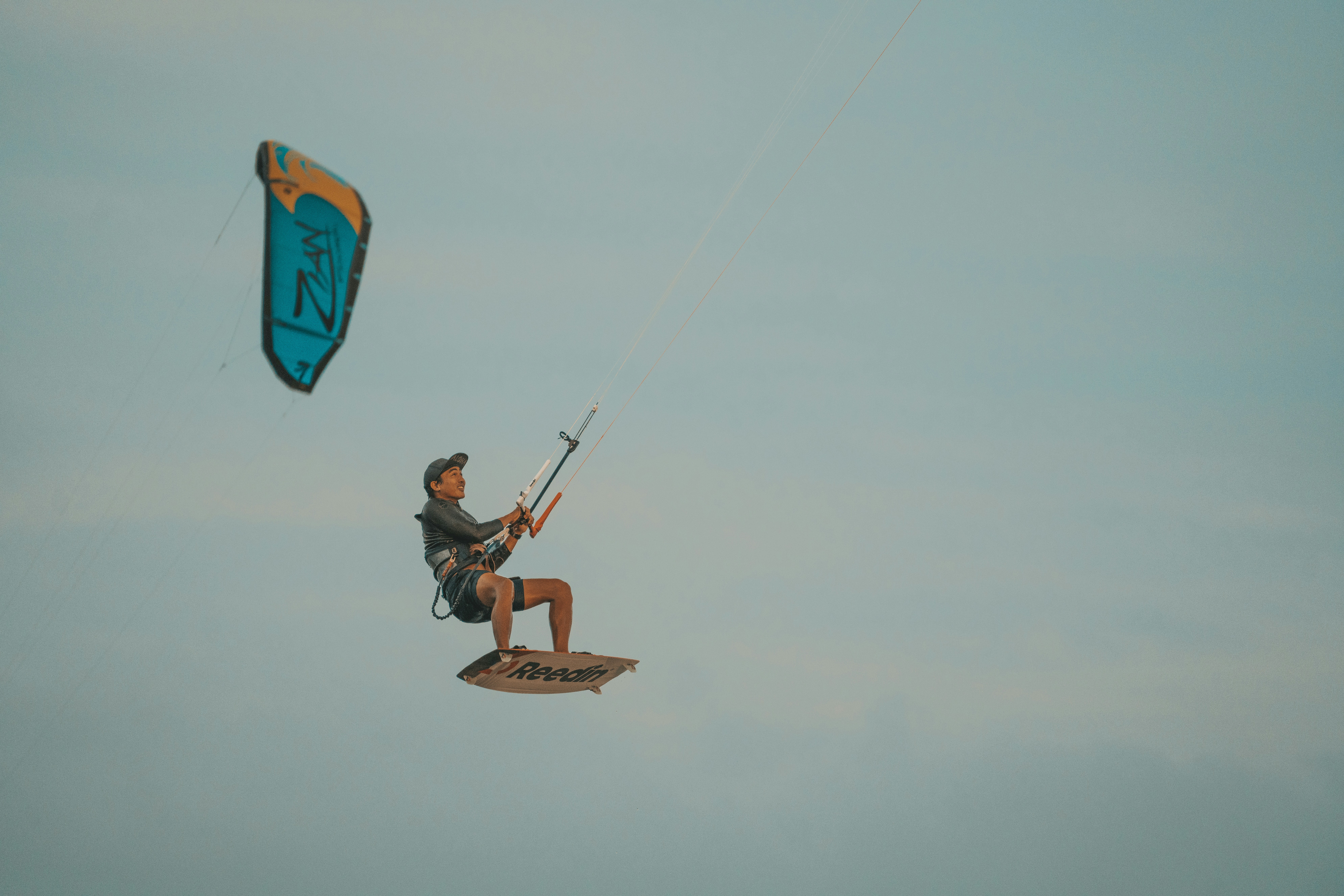 a man flying a kite in the sky