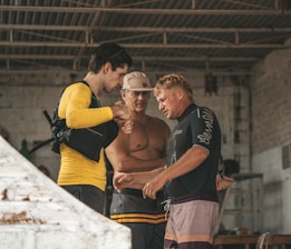 a group of men standing next to each other