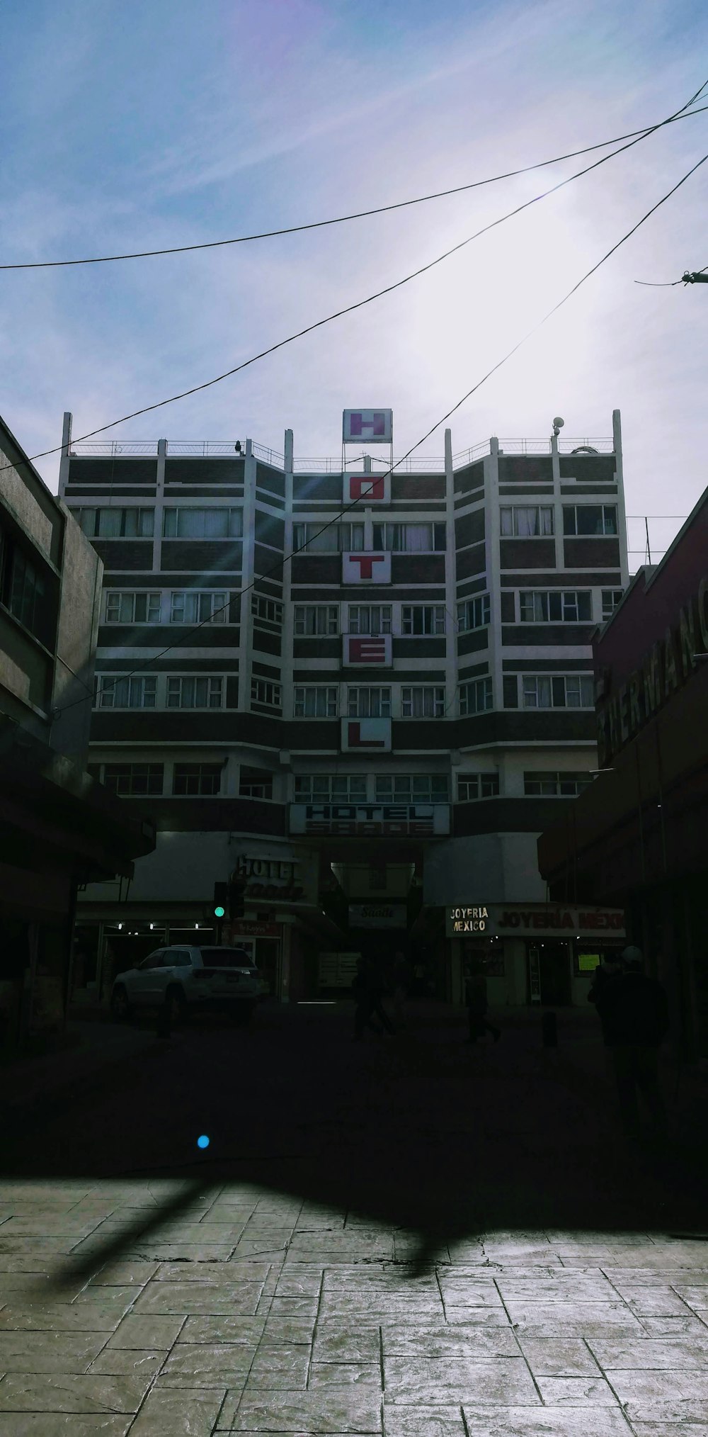 a large building with many balconies on the top of it