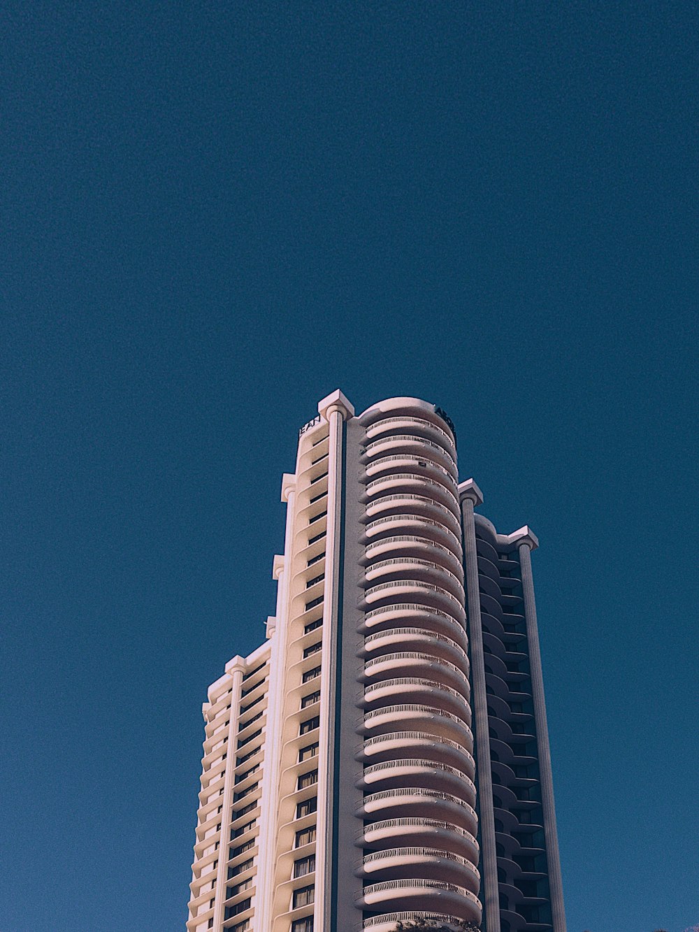 a large tall tower with a sky background