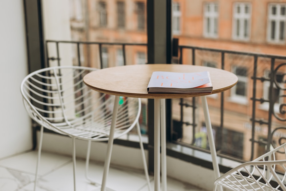 a table with a book sitting on top of it