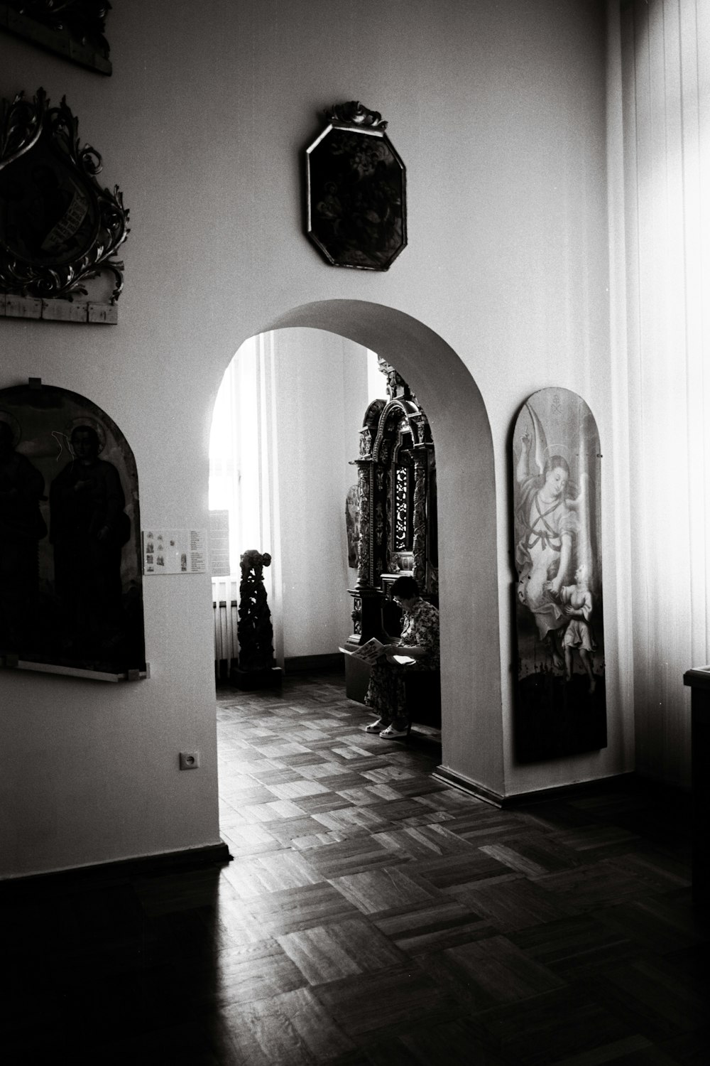 a black and white photo of a hallway