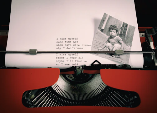 an old typewriter with a picture of a child on it