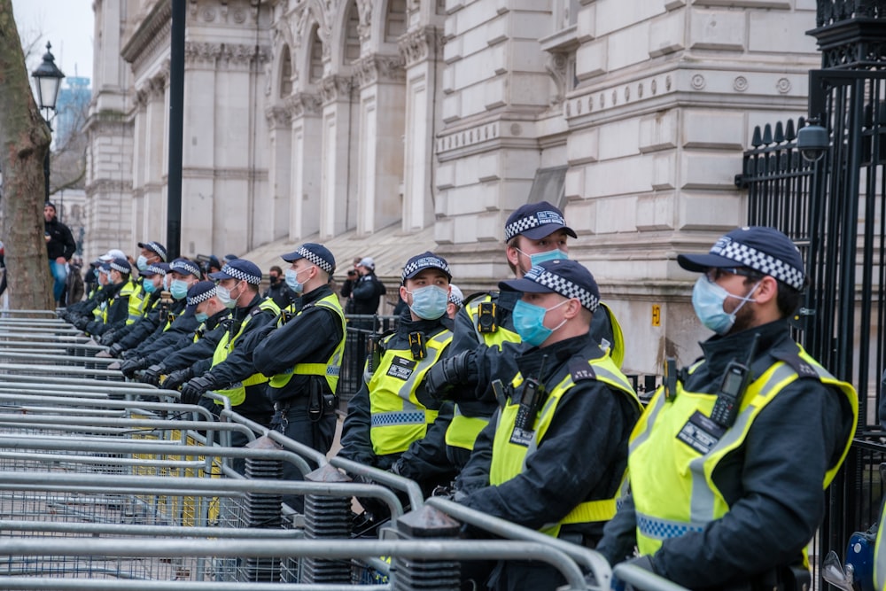 a row of police standing next to each other