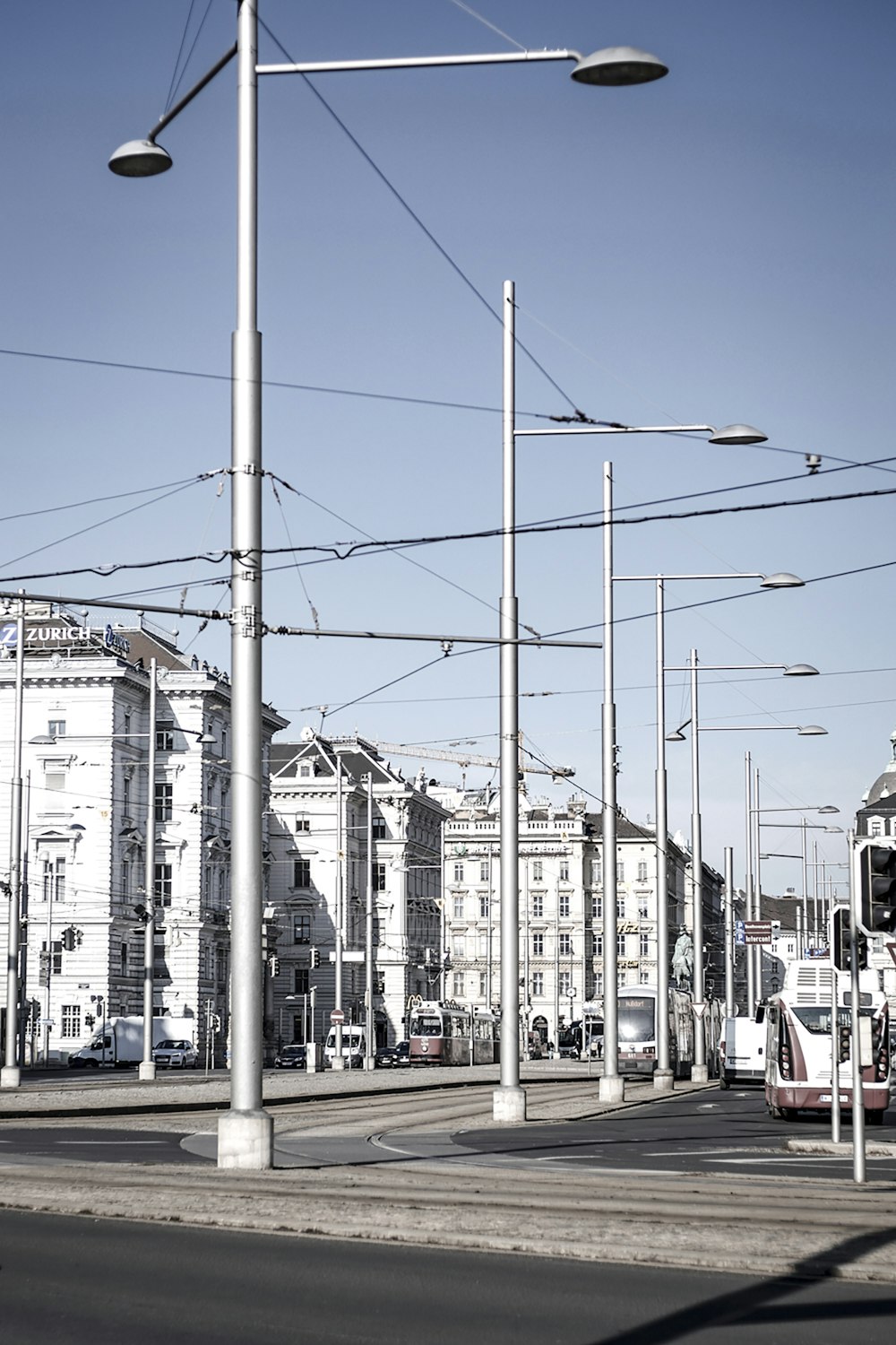 a city street with lots of traffic and street lights