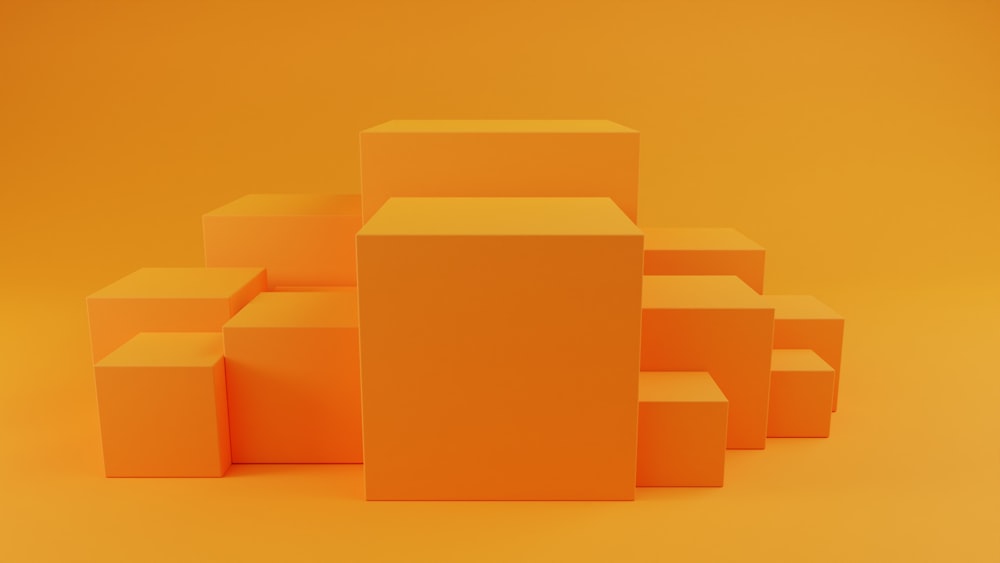 a group of cubes sitting on top of a yellow surface