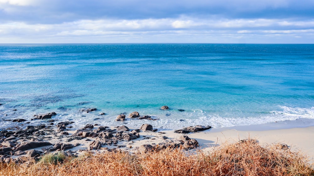 a view of the ocean from a cliff