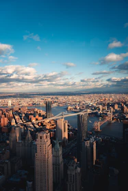 an aerial view of a city with tall buildings