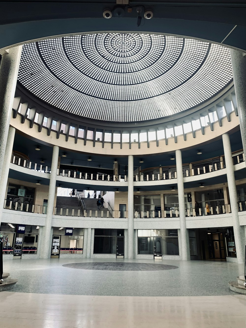 a large circular building with a circular ceiling