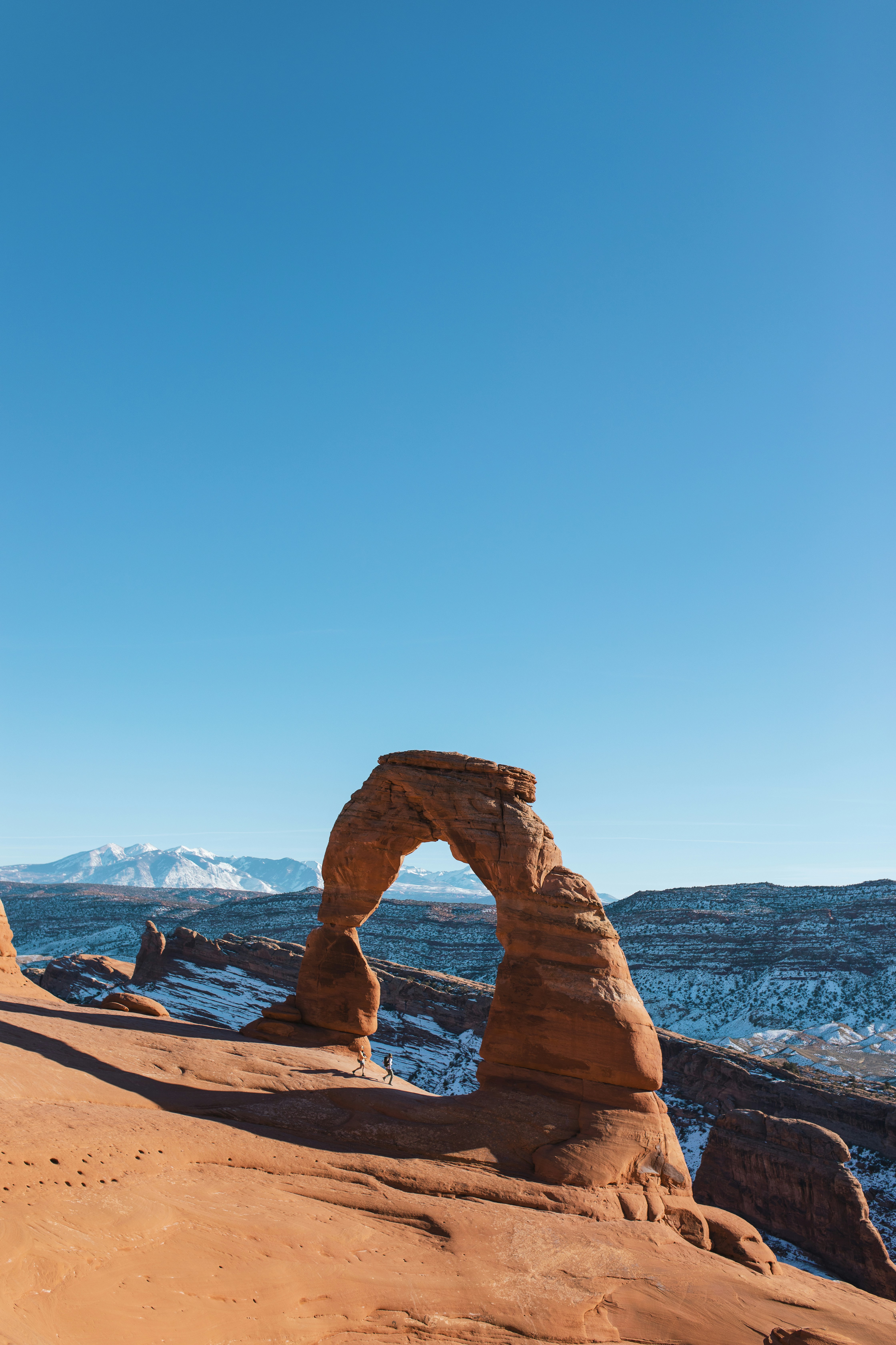 a large rock formation in the middle of a desert