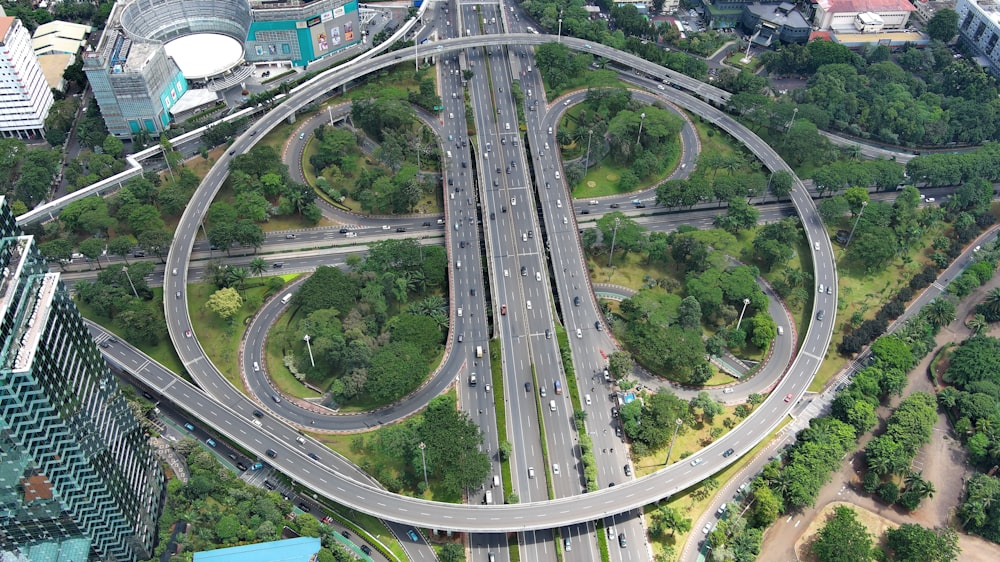 an aerial view of a highway intersection in a city