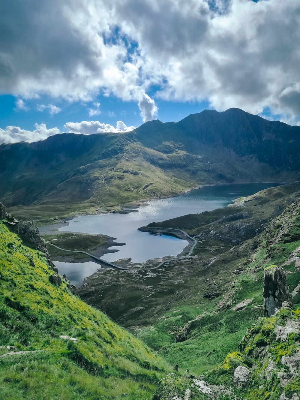 a large body of water surrounded by mountains