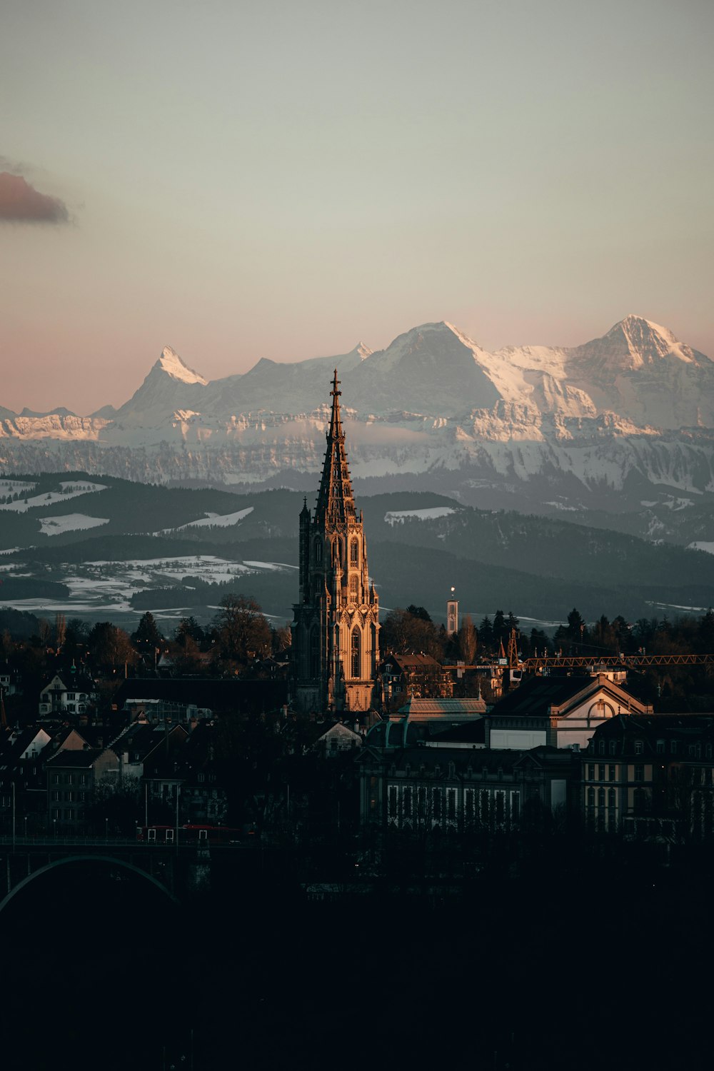 a view of a city with mountains in the background