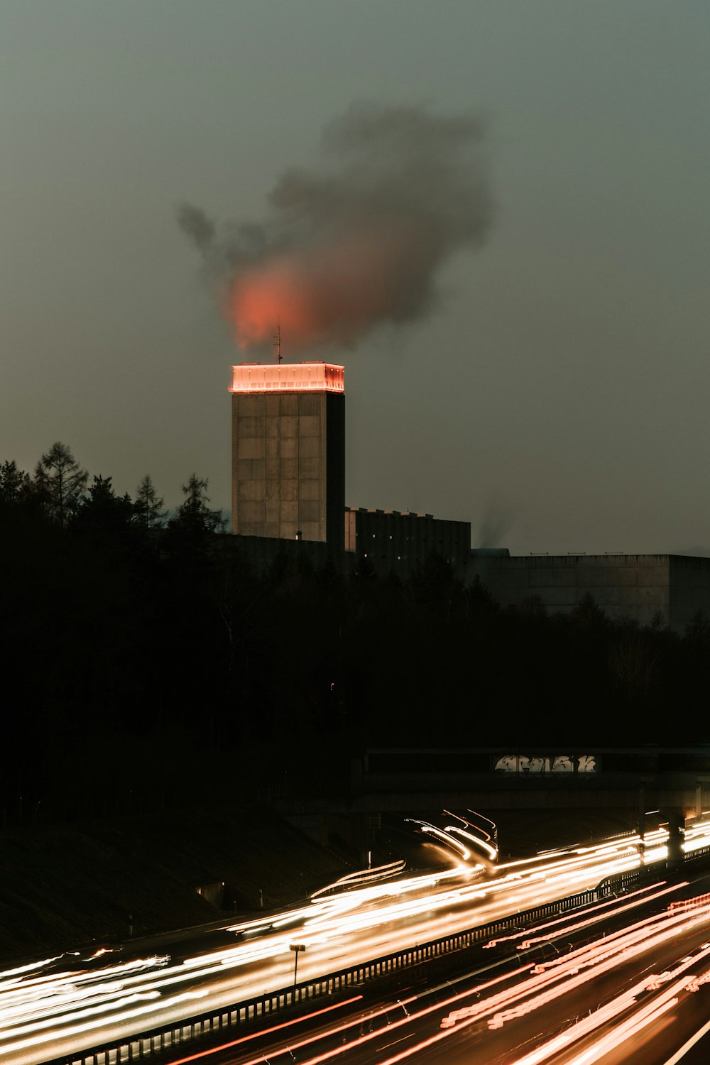 a factory with smoke coming out of it