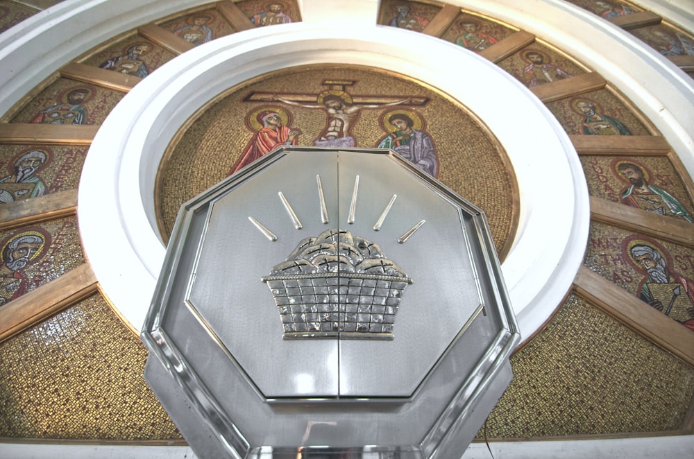 a clock with a picture of a ship on it