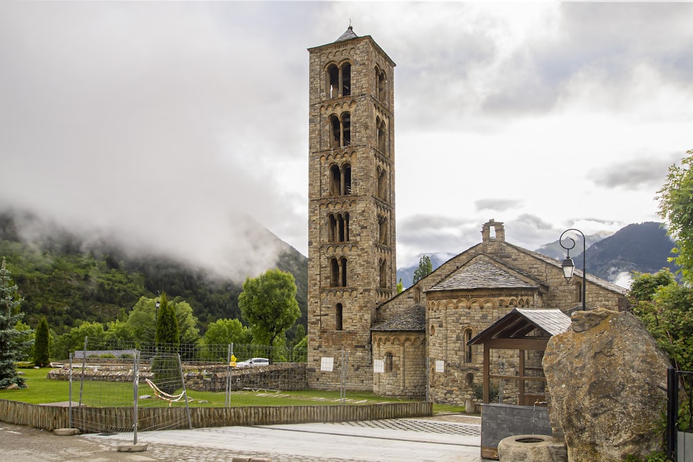 a large stone building with a tall tower