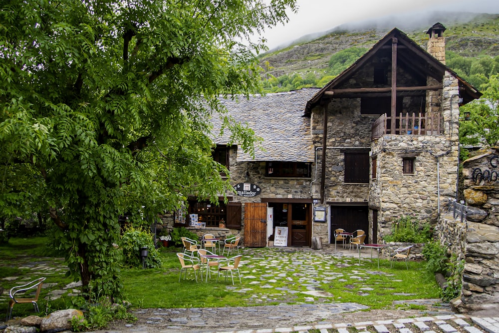 a stone house with a stone pathway leading to it