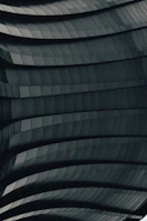 Detailed view of CNC laser-cut steel panels ready for architectural cladding.