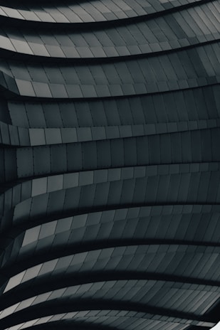 Detailed view of a laser-cut steel panel with intricate patterns.