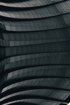 Detailed view of CNC laser-cut steel panels ready for architectural cladding.