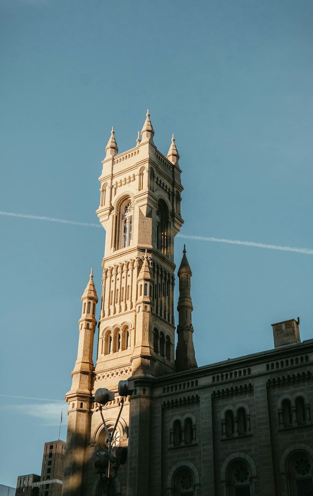 a tall building with a clock on the front of it