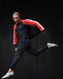 a man with a backpack is running