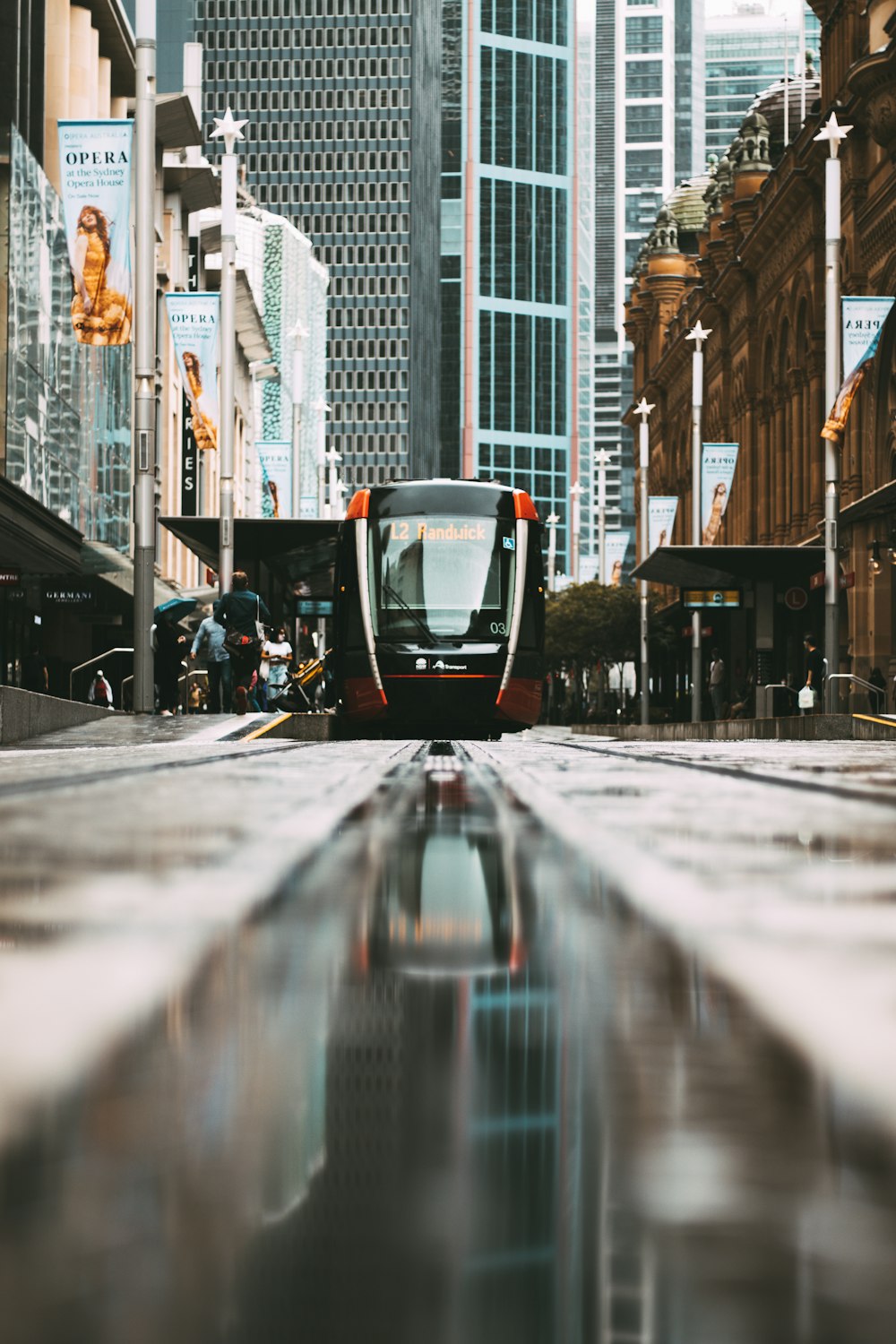 a street scene with a train on the tracks