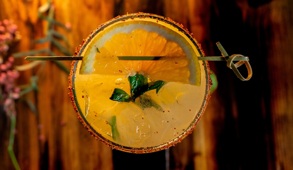 a close up of a drink in a glass on a table