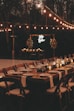 a long table is set up for a formal dinner