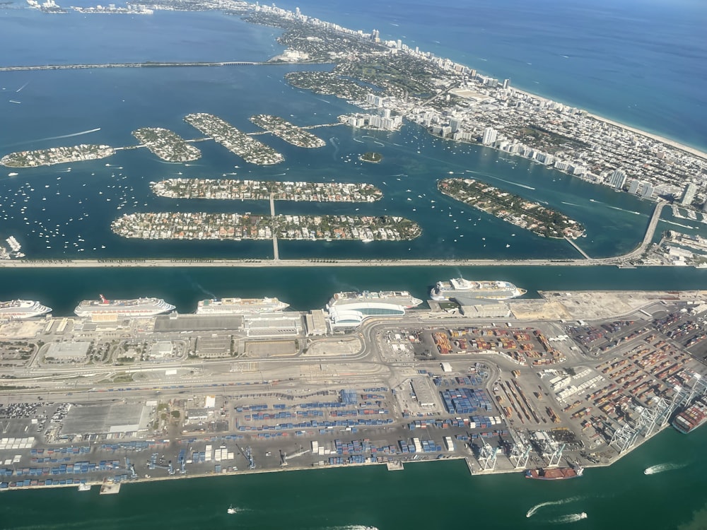 an aerial view of a city and a body of water