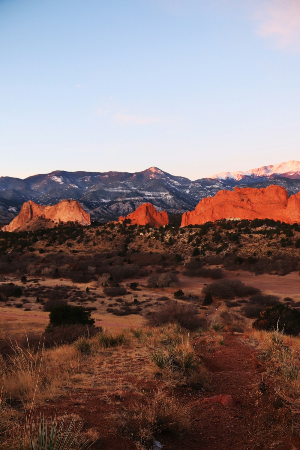 a view of a mountain range at sunset