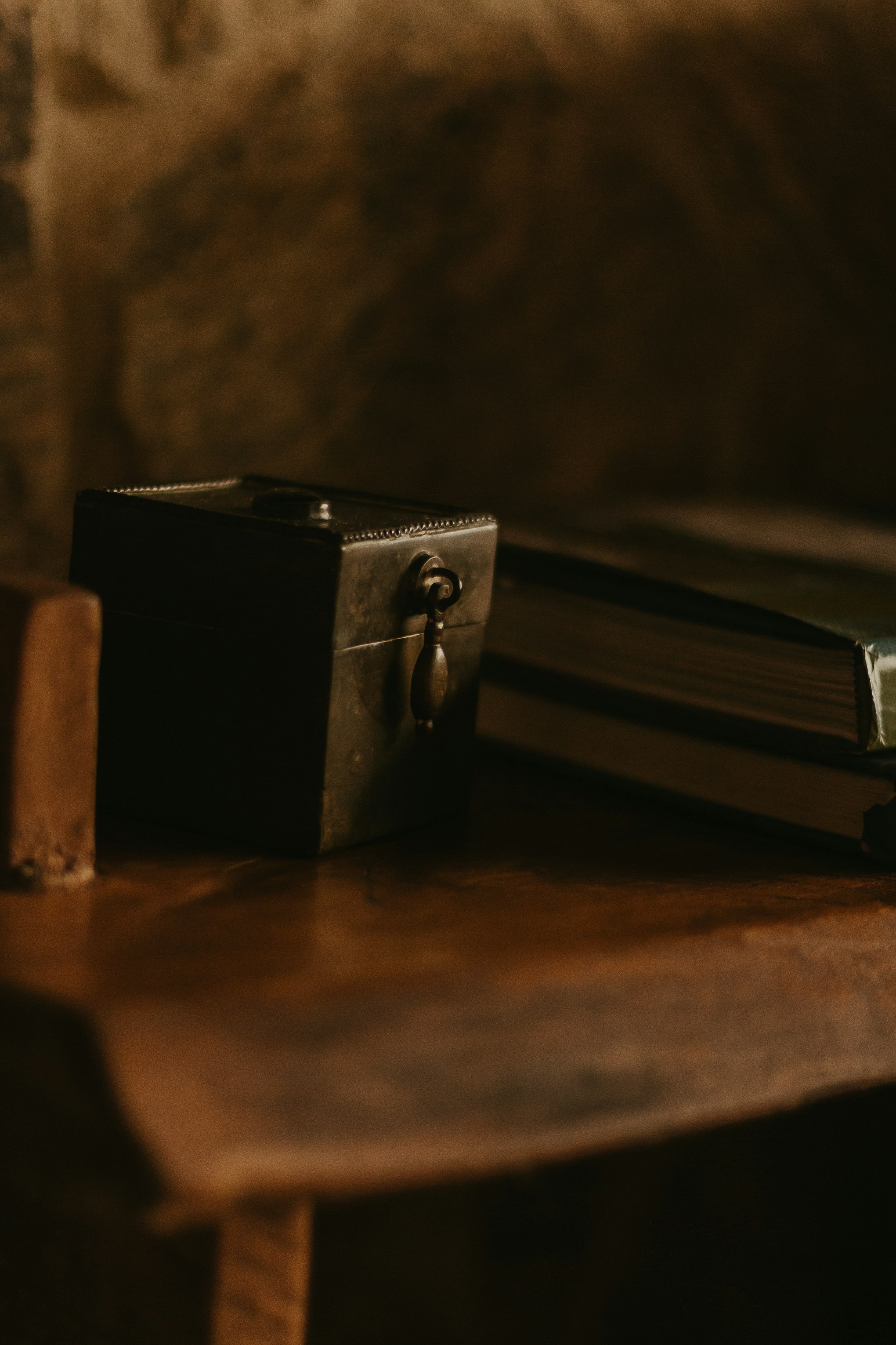 a suitcase sitting on top of a wooden table