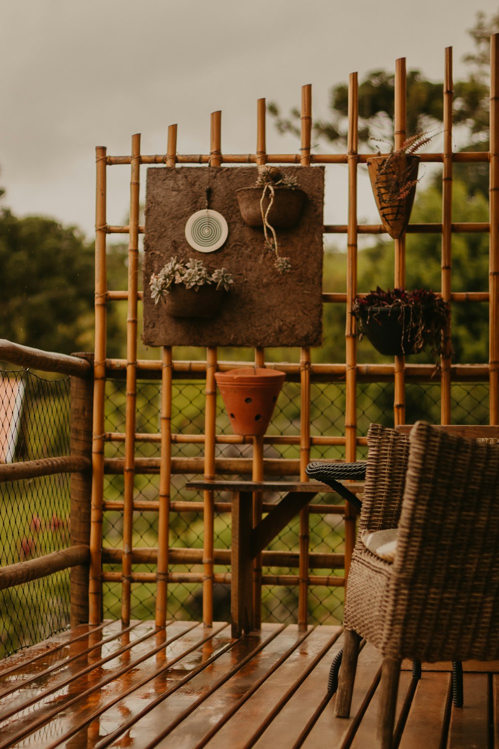 a table and chairs on a wooden deck