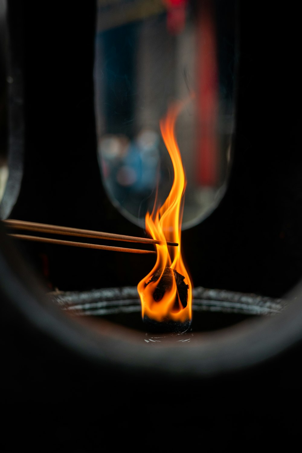 a close up of a fire burning in a bowl