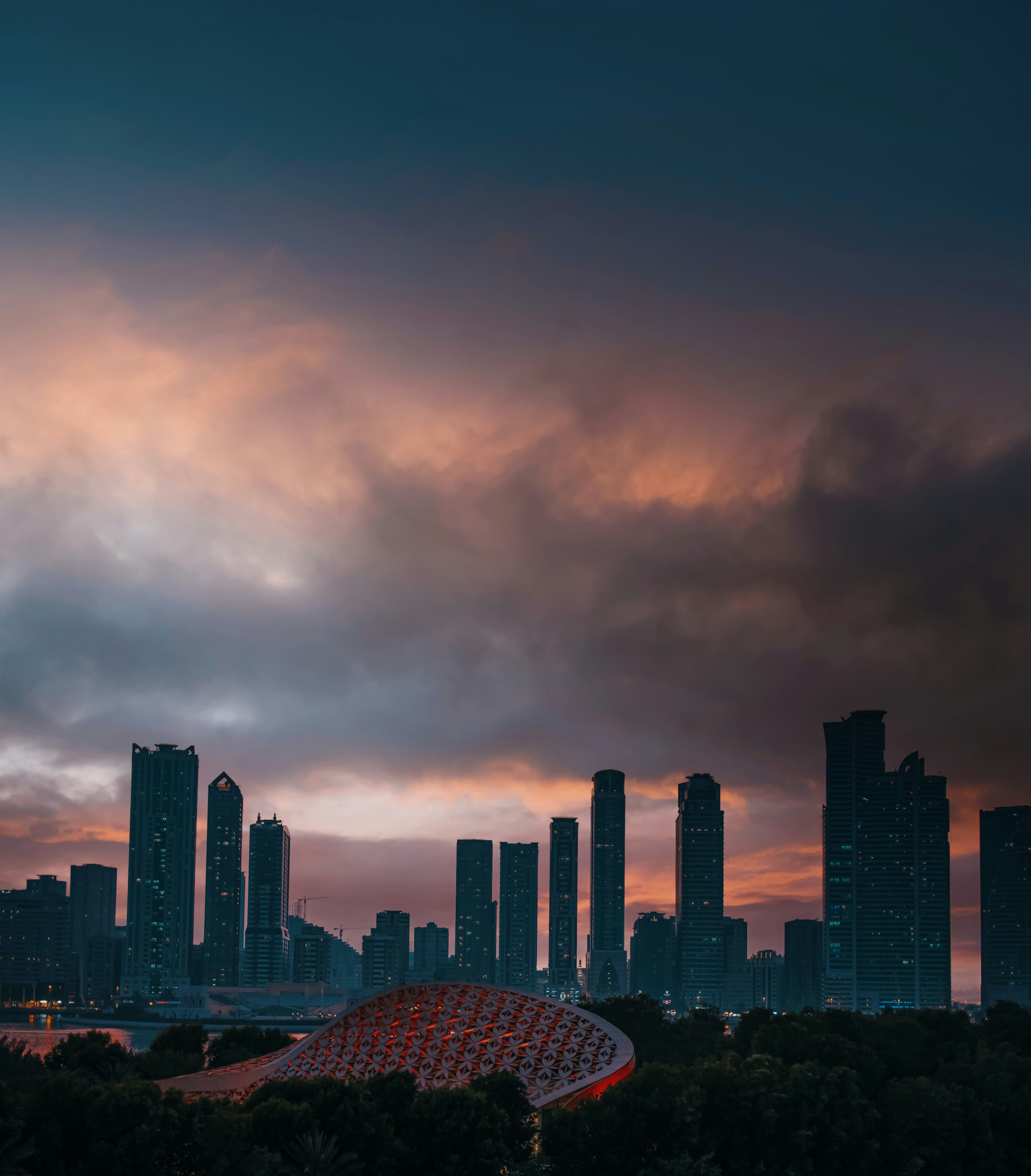Sharjah city skyline at sunset