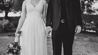 a man and a woman standing next to each other