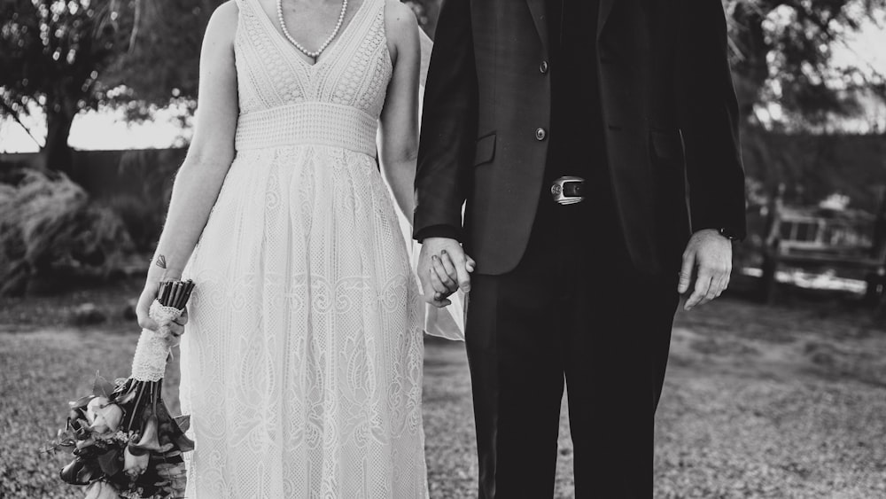 a man and a woman standing next to each other