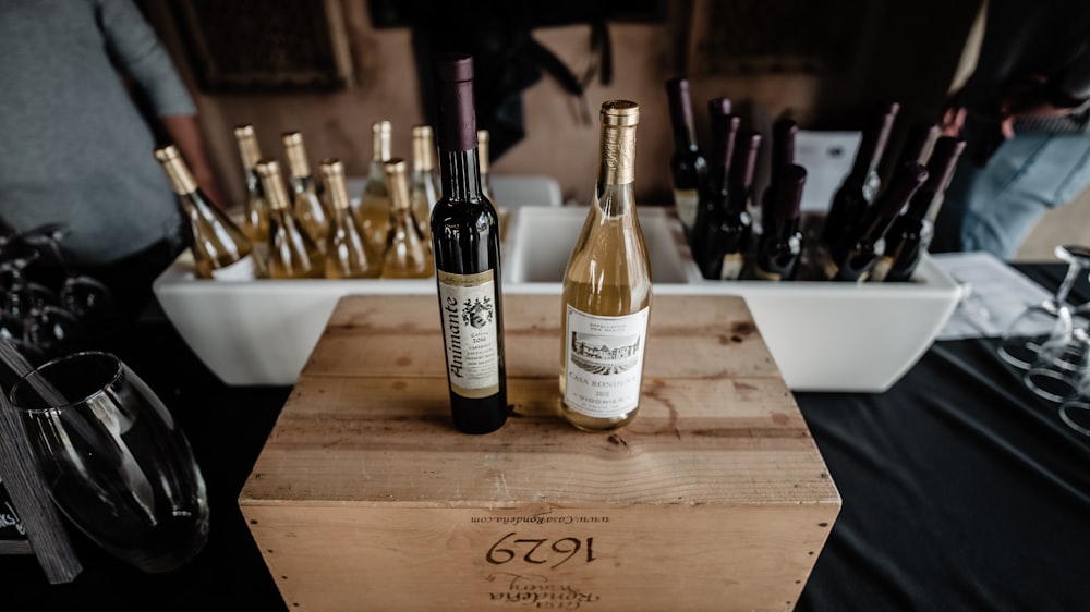 a wooden box filled with bottles of wine