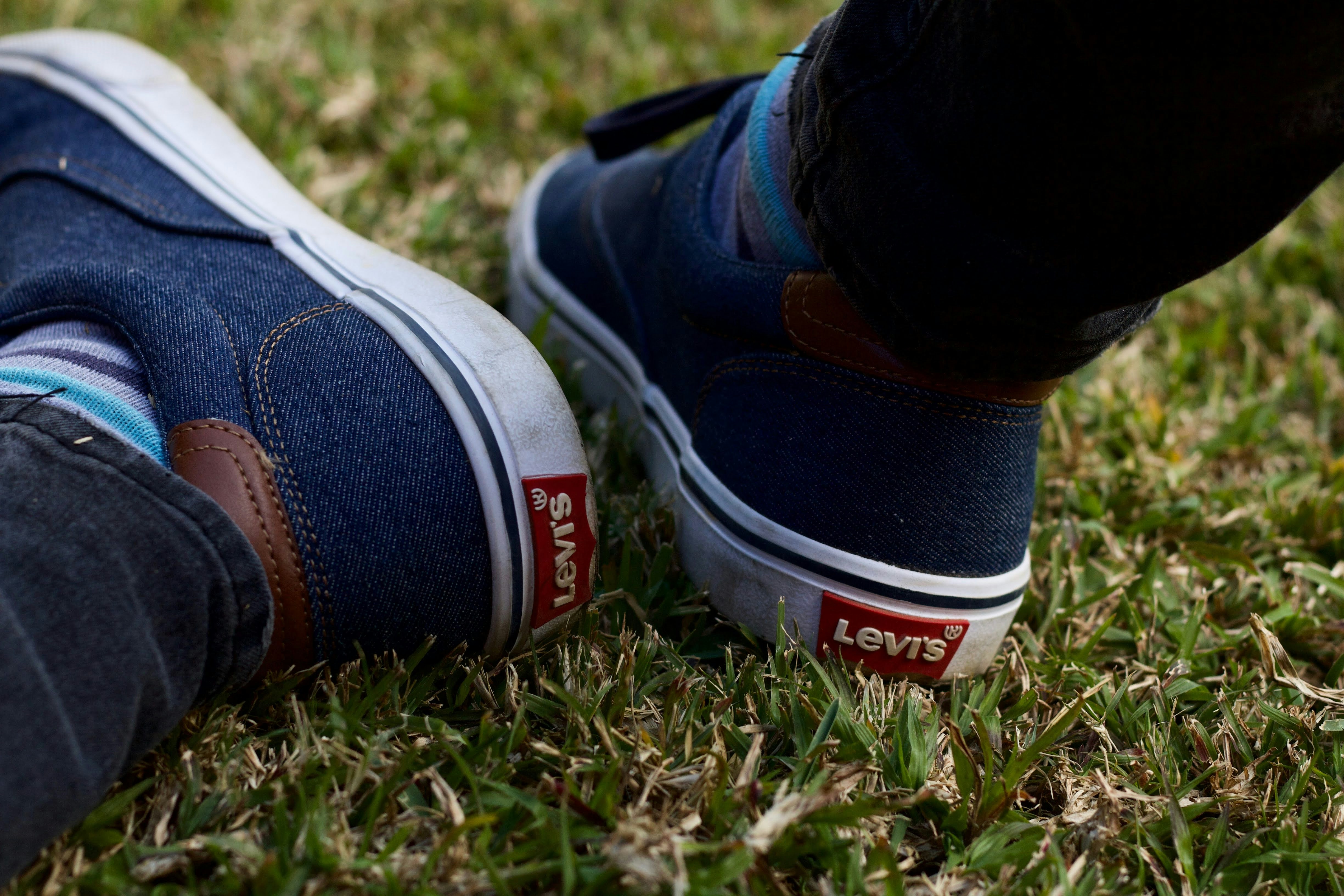A person's feet in a pair of blue shoes photo – Free Apparel Image on ...