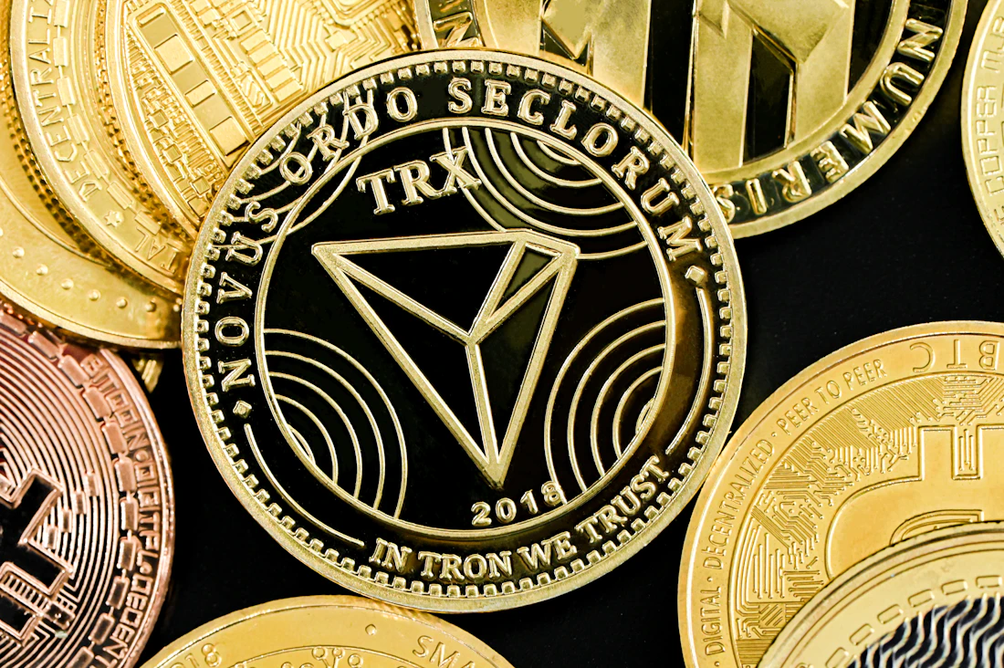 A pile of gold and silver cryptocurrency coins