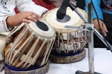 a close up of a person playing a musical instrument