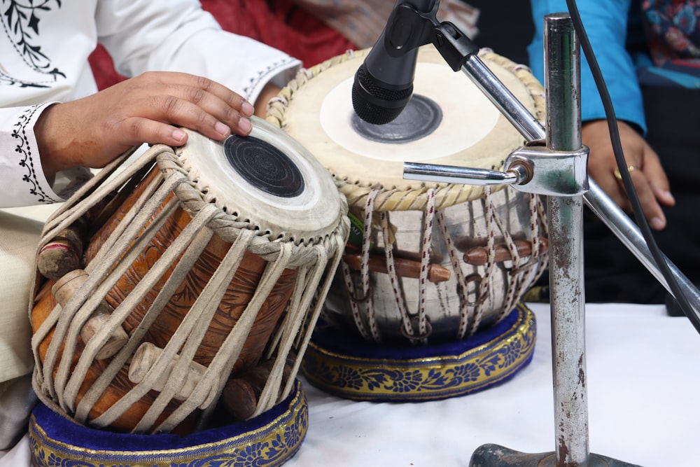 a close up of a person playing a musical instrument