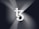 A large, stylized 'T' and 'Z' logo appears prominently in the center, with a series of gradient lines radiating outward, creating a sense of movement and depth. The background features shades of dark gray and black, enhancing the contrast with the white logo.